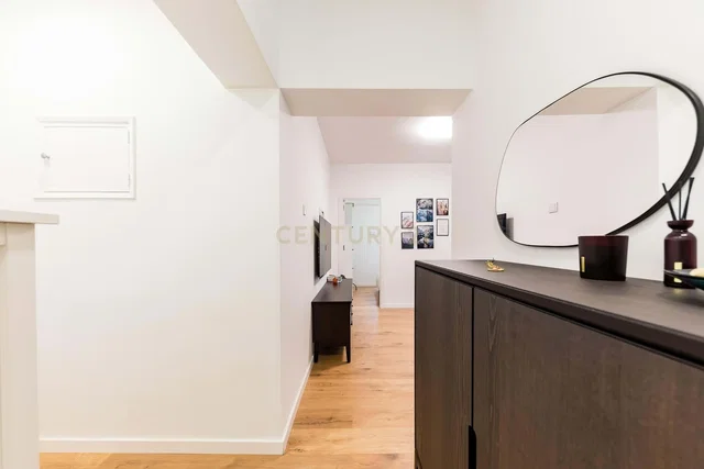 Kitchen; kitchen appliances, wood floor, natural light, modern style