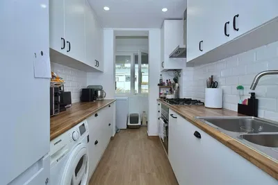 Kitchen; kitchen appliances, wood floor, natural light, modern style