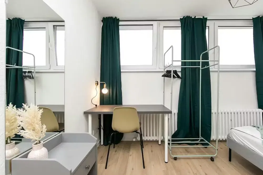 Kitchen; kitchen appliances, wood floor, natural light, modern style