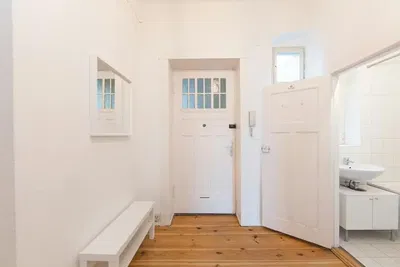 Kitchen; kitchen appliances, wood floor, natural light, modern style