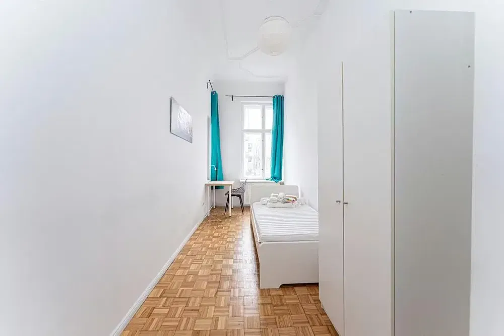 Kitchen; kitchen appliances, wood floor, natural light, modern style