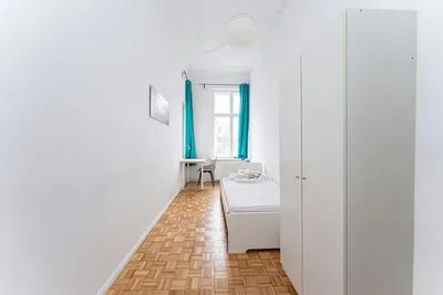 Kitchen; kitchen appliances, wood floor, natural light, modern style