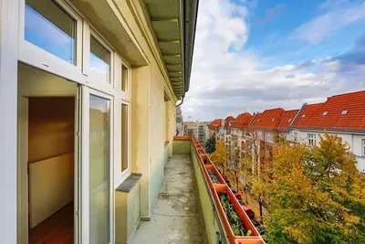 Kitchen; kitchen appliances, wood floor, natural light, modern style