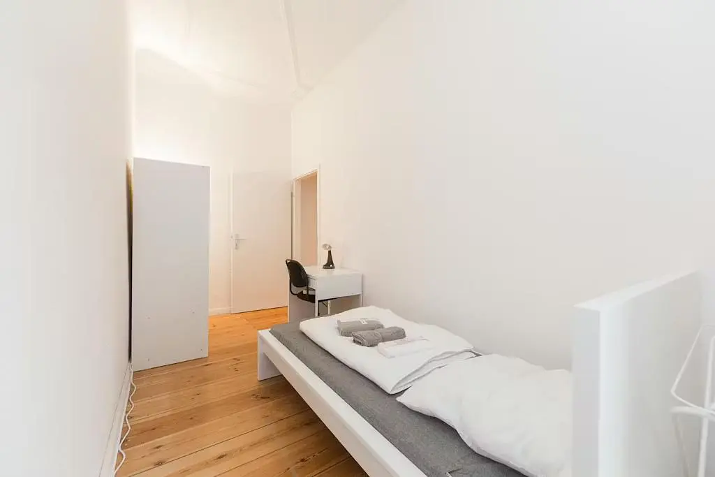 Kitchen; kitchen appliances, wood floor, natural light, modern style