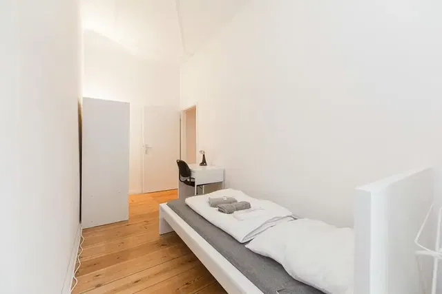 Kitchen; kitchen appliances, wood floor, natural light, modern style