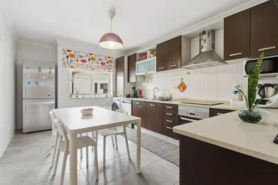Kitchen; kitchen appliances, wood floor, natural light, modern style