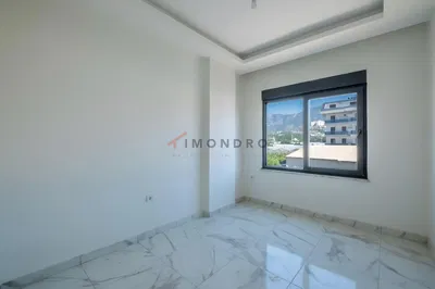 Σαλόνι; ξύλινο πάτωμα, φυσικό φως, μοντέρνο στυλ