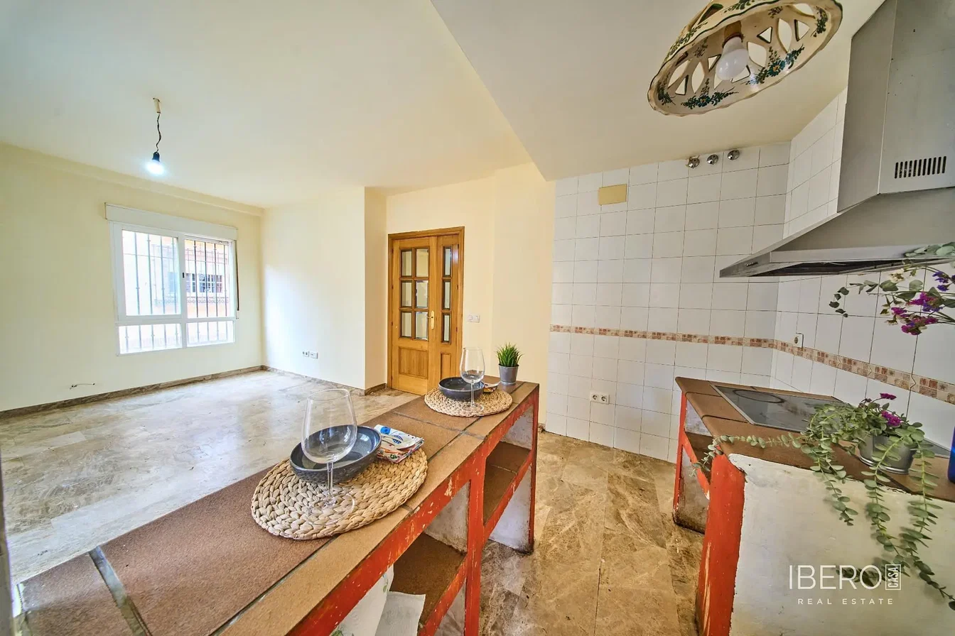 Kitchen; kitchen appliances, wood floor, natural light, modern style