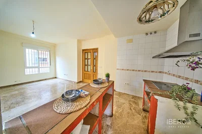 Kitchen; kitchen appliances, wood floor, natural light, modern style