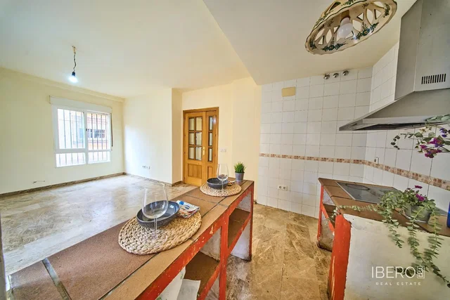 Kitchen; kitchen appliances, wood floor, natural light, modern style