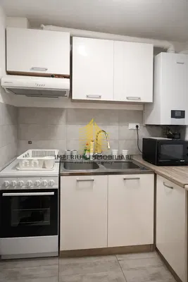 Cuisine; électroménager, parquet, lumière naturelle, style moderne