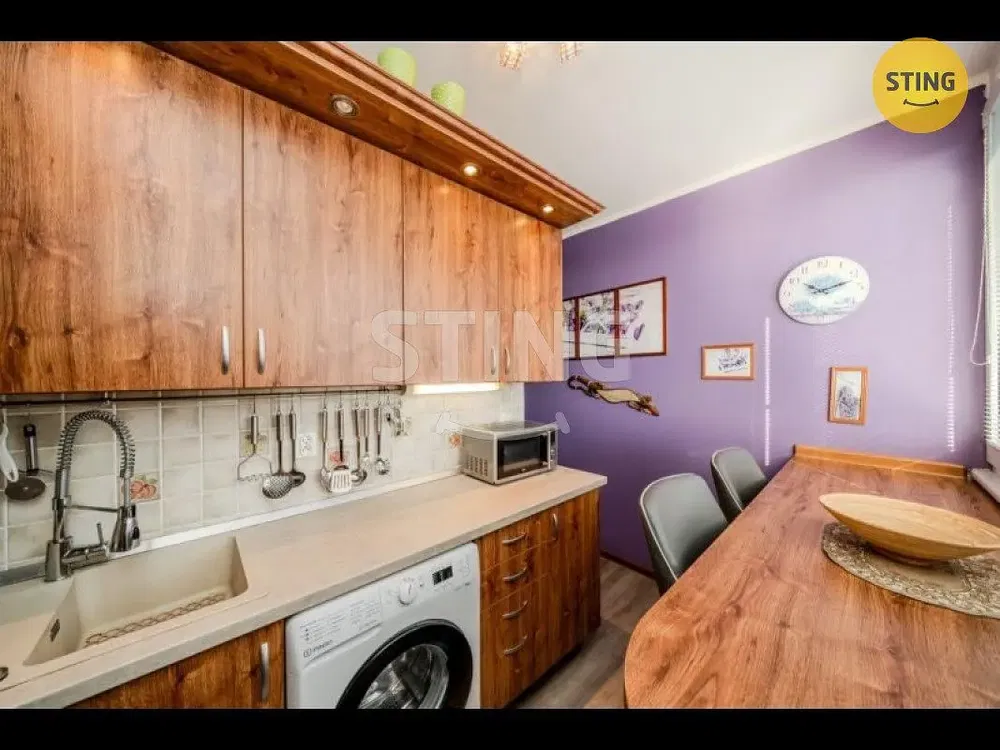 Kitchen; kitchen appliances, wood floor, natural light, modern style