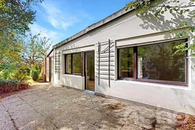 Kitchen; kitchen appliances, wood floor, natural light, modern style
