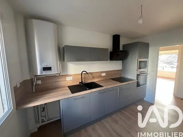 Kitchen; kitchen appliances, wood floor, natural light, modern style