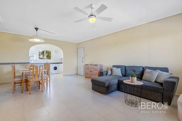 Kitchen; kitchen appliances, wood floor, natural light, modern style