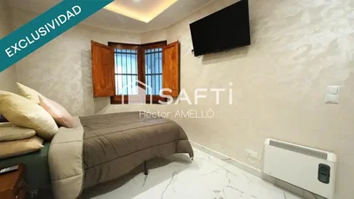 Bedroom; tile floor, natural light