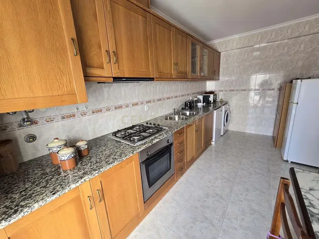 Kitchen; kitchen appliances, tile floor