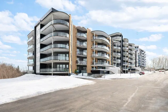 House and surroundings; view