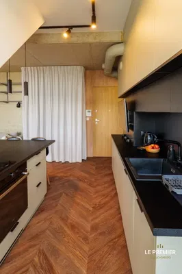 Kitchen; kitchen appliances, wood floor, natural light, modern style