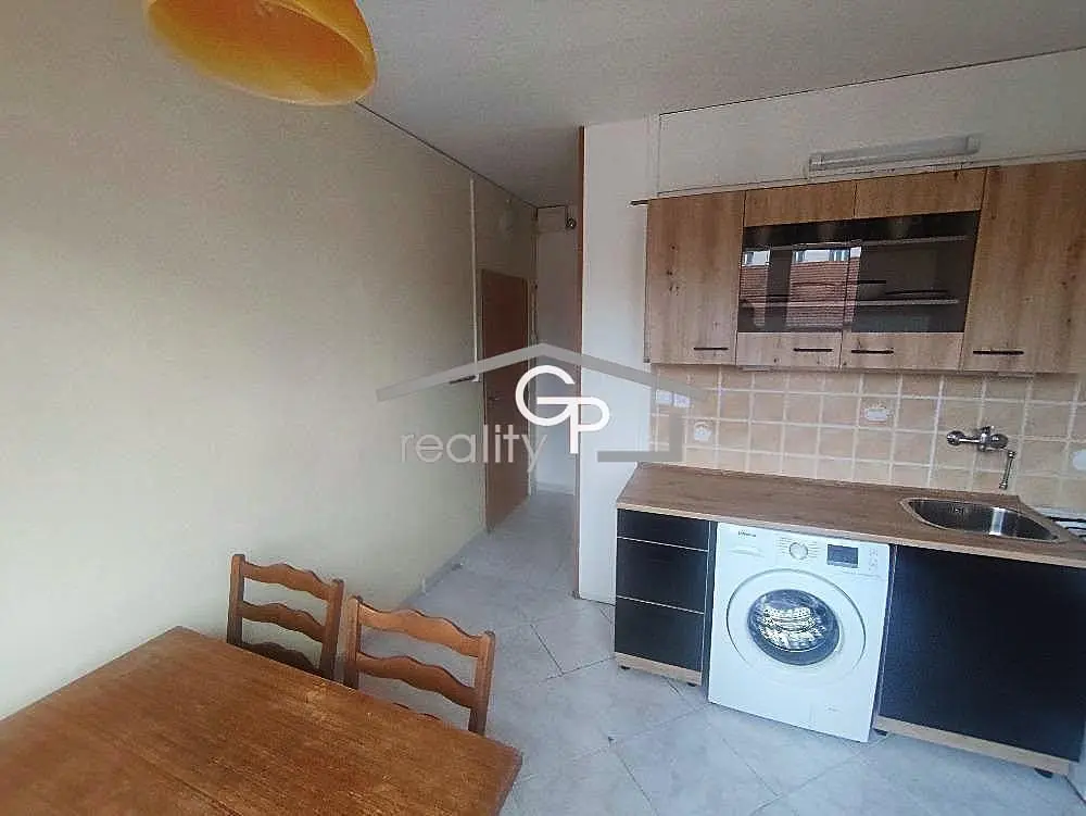 Kitchen; kitchen appliances, wood floor, natural light, modern style