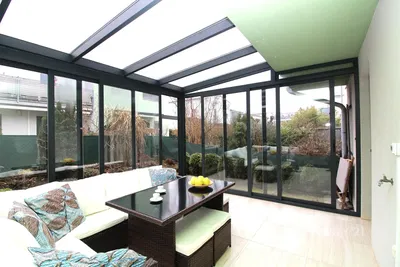 Kitchen; kitchen appliances, wood floor, natural light, modern style