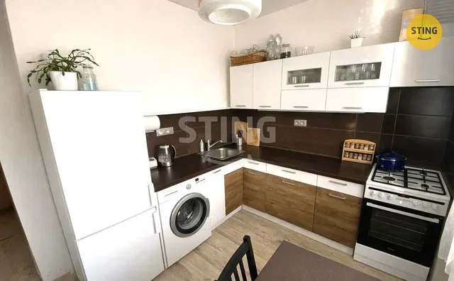 Kitchen; kitchen appliances, wood floor, natural light, modern style