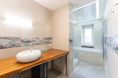 Kitchen; kitchen appliances, wood floor, natural light, modern style