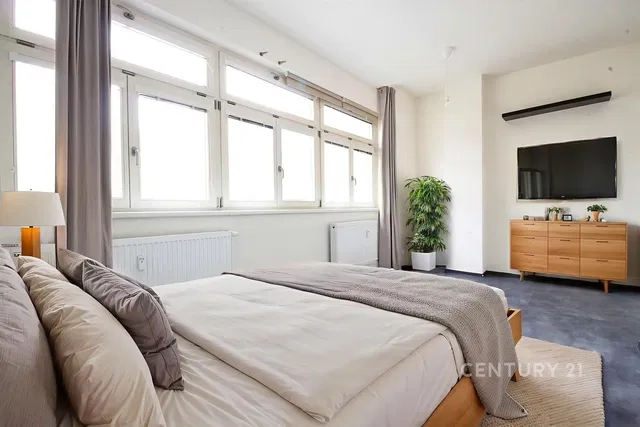 Kitchen; kitchen appliances, wood floor, natural light, modern style