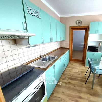 Kitchen; kitchen appliances, tile floor, wood floor