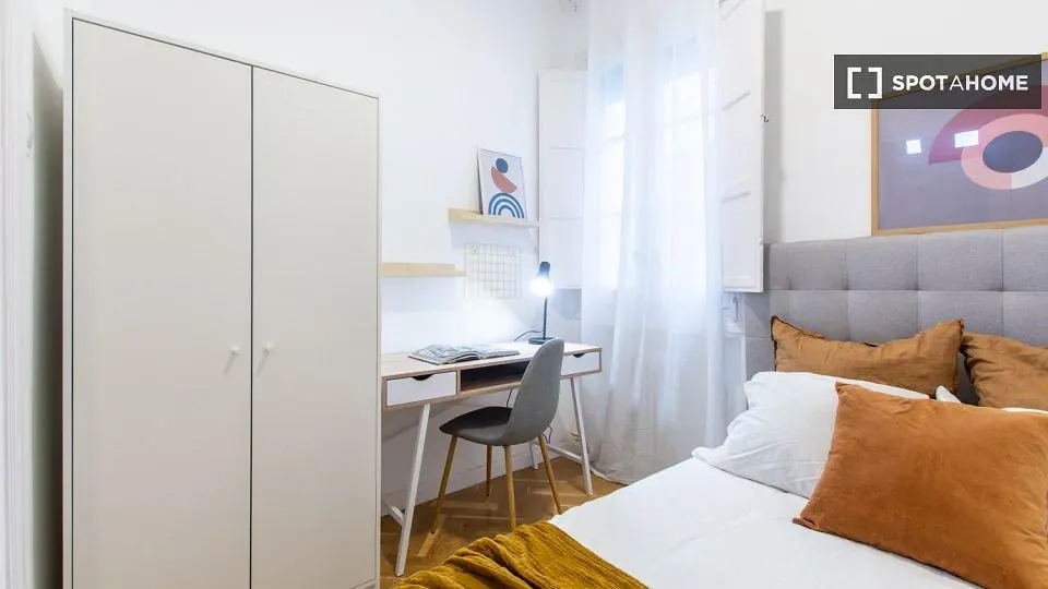 Camera da letto; luce naturale, stile moderno