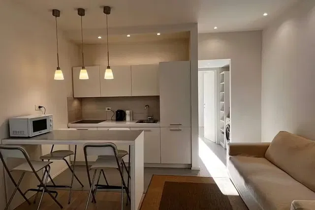 Living room; kitchen appliances, natural light, modern style