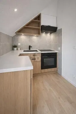 Kitchen; kitchen appliances, wood floor, renovated, natural light