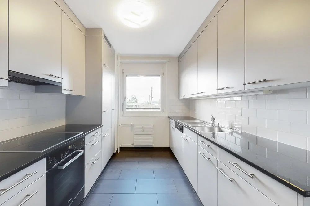 Kitchen; kitchen appliances, tile floor, natural light, modern style