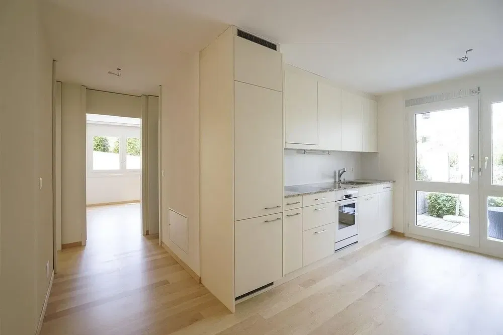 Kitchen; kitchen appliances, natural light, wood floor, renovated