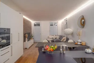 Living room; natural light, modern style, wood floor, renovated