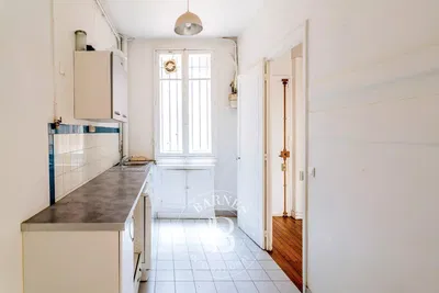 Kitchen; natural light, tile floor, needs renovation