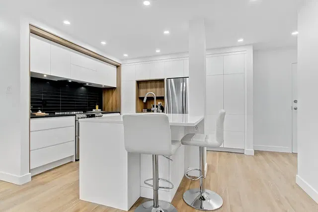 Kitchen; kitchen appliances, natural light, modern style, tile floor, wood floor