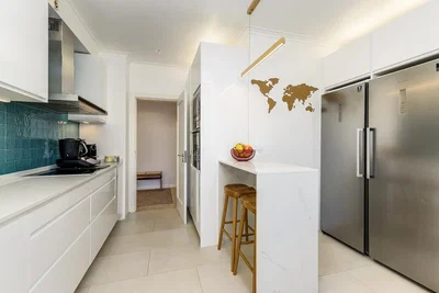 Kitchen; kitchen appliances, natural light, modern style, tile floor