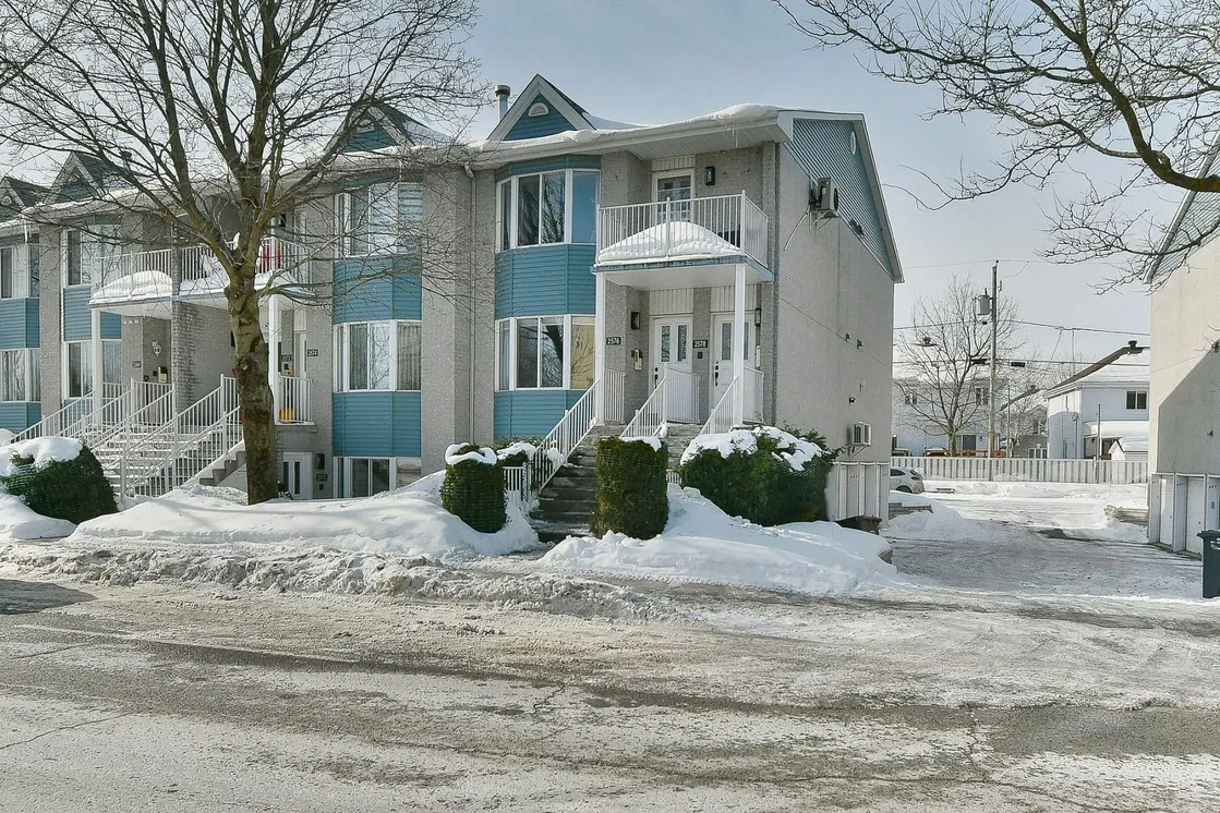 House and surroundings; view