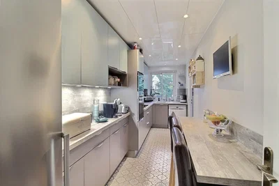 Kitchen; kitchen appliances, tile floor, natural light, modern style