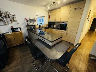 Kitchen; kitchen appliances, wood floor, natural light