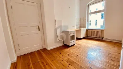 Kitchen; kitchen appliances, wood floor, natural light