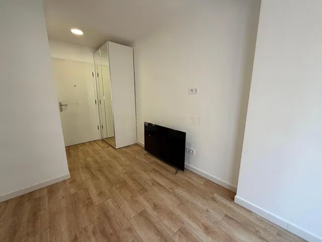 Bedroom; tile floor, renovated, natural light