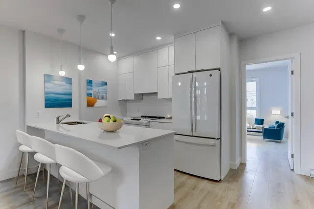 Kitchen; kitchen appliances, natural light, modern style, tile floor