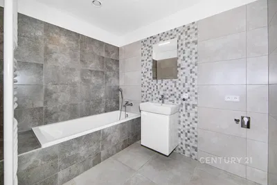 Bathroom; tile floor, renovated, natural light, modern style