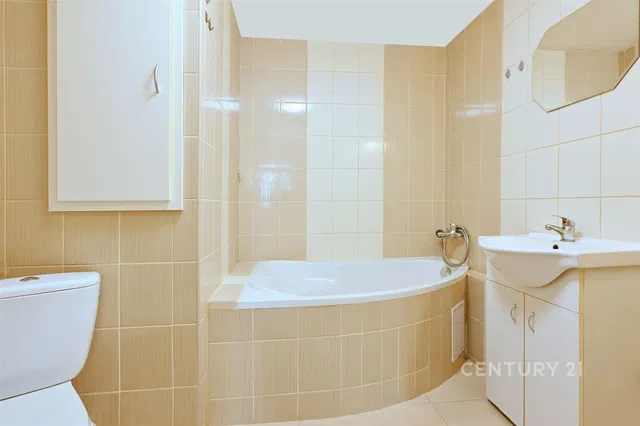 Bathroom; tile floor, renovated, natural light, modern style