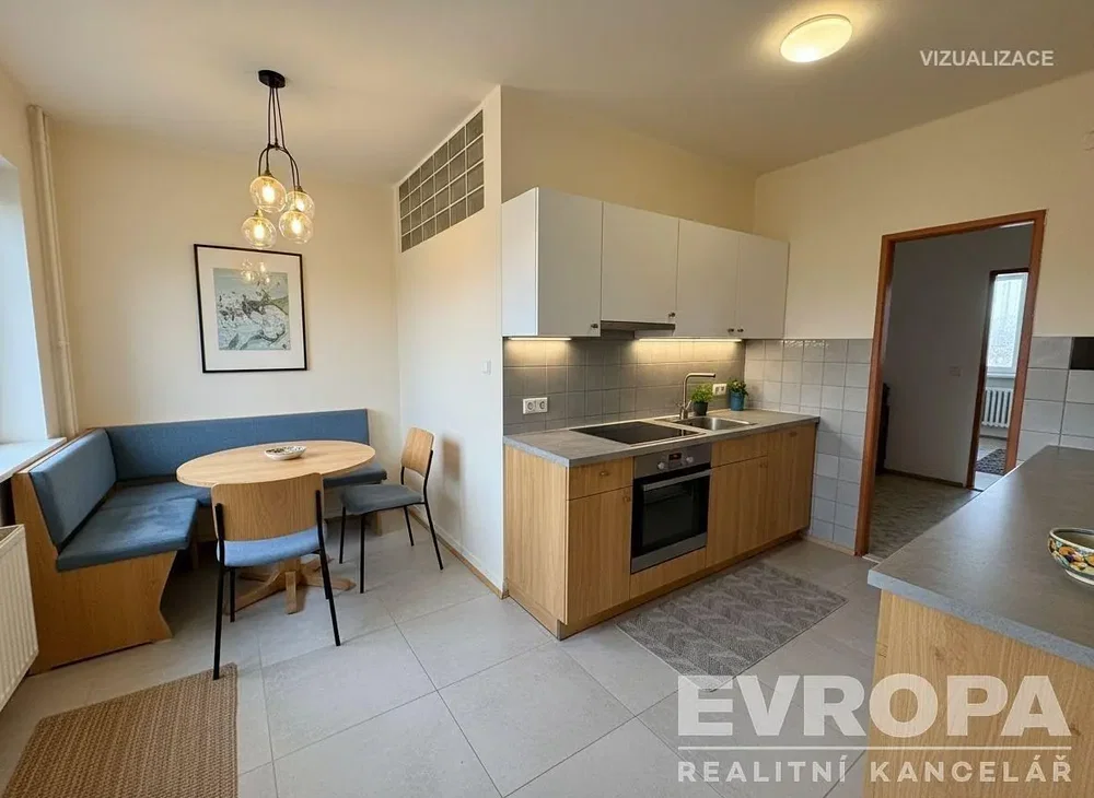 Keuken; keukenapparatuur, tegelvloer, natuurlijk licht