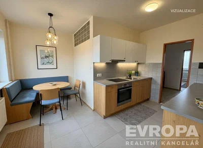 Keuken; keukenapparatuur, tegelvloer, natuurlijk licht