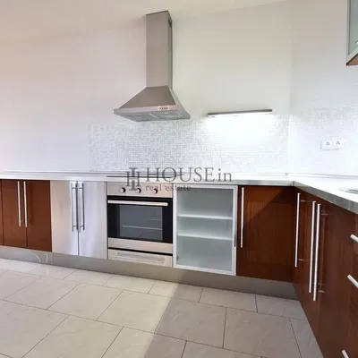 Kitchen; kitchen appliances, tile floor, renovated, natural light, modern style