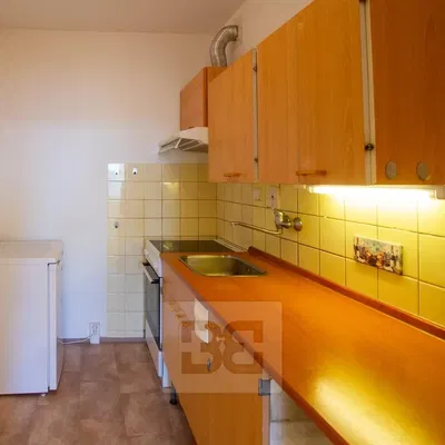 Kitchen; kitchen appliances, tile floor, needs renovation